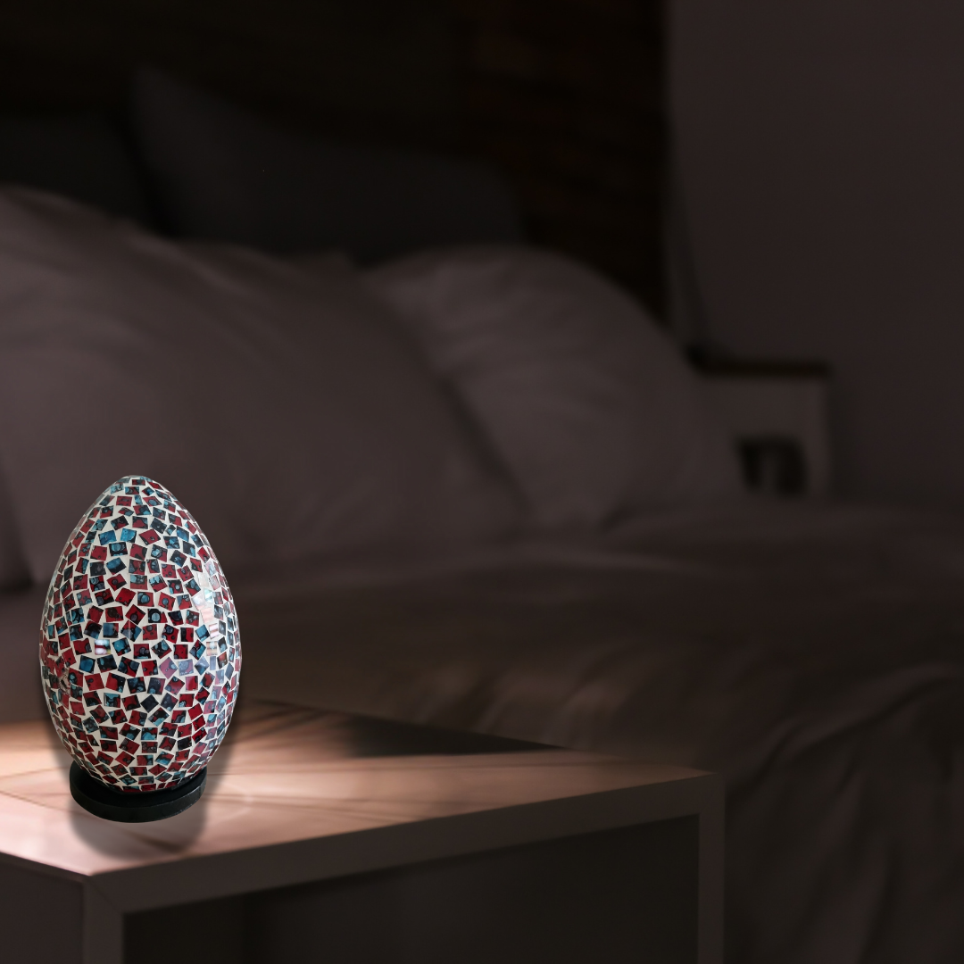 Two oval mosaic art lamps in multicolor, with a geometric pattern, designed for home decor.