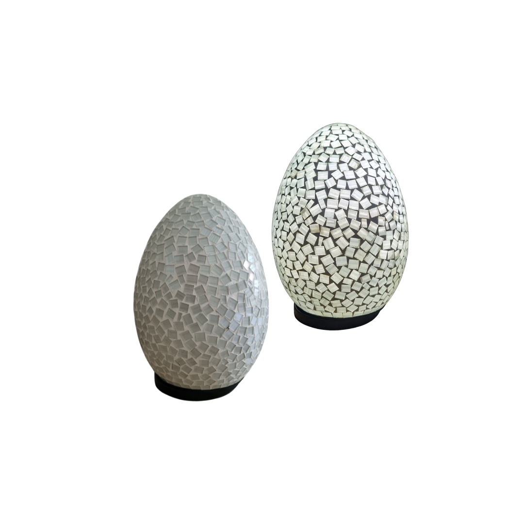 Two oval mosaic art lamps in white, with a geometric pattern, designed for home decor.