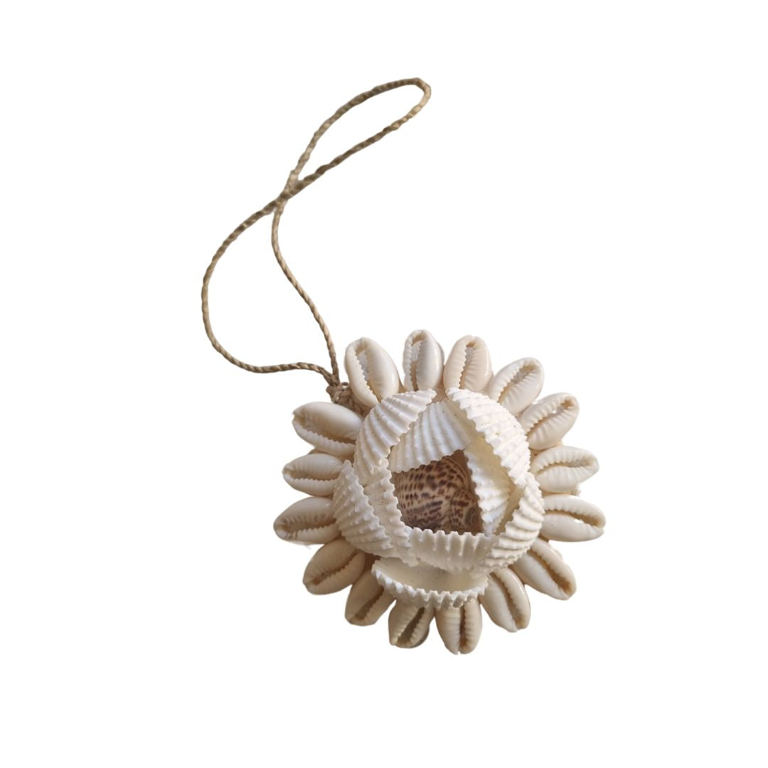 Decorative sunflower ornament with a string on a white background