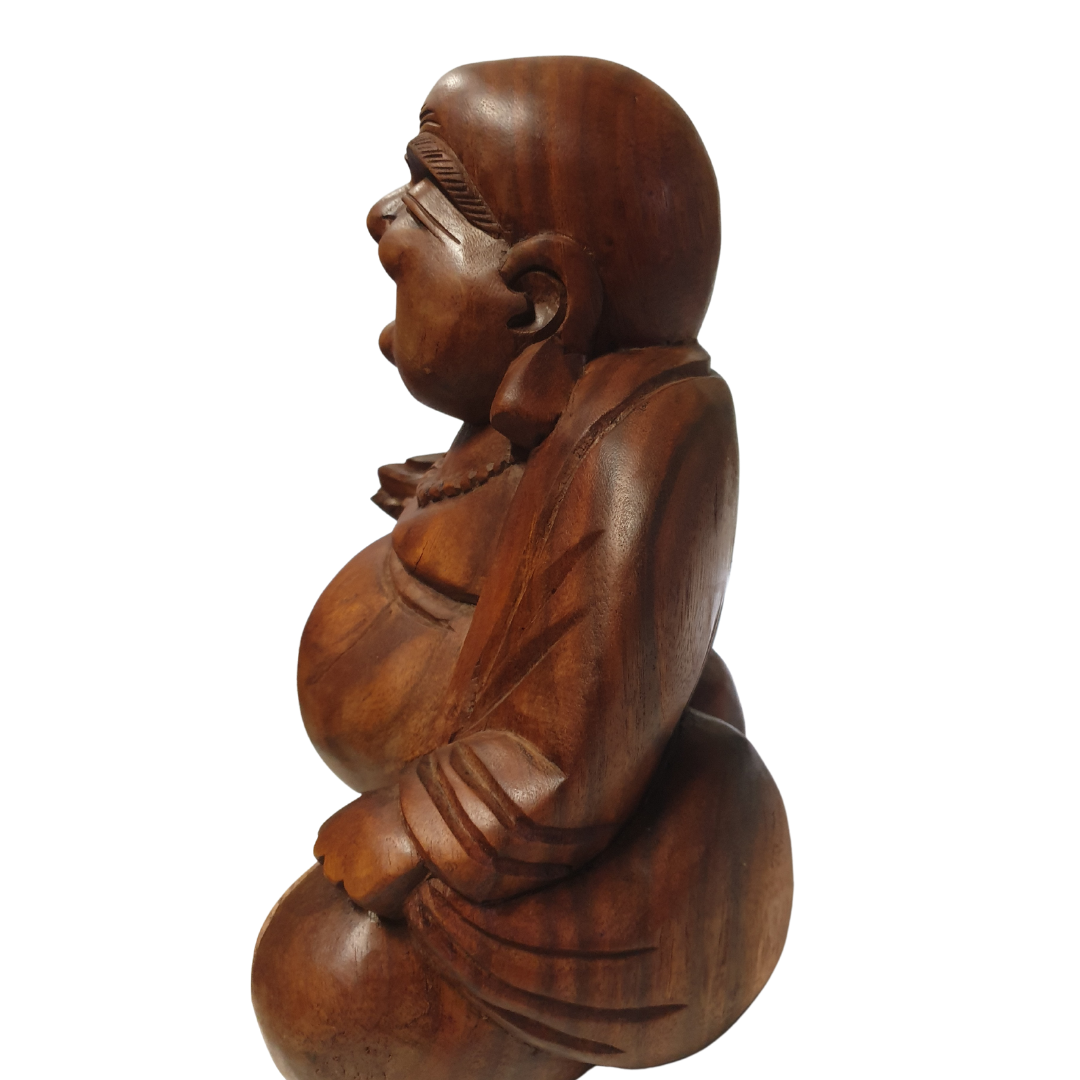 Happy Budda statue side view, on a white back ground