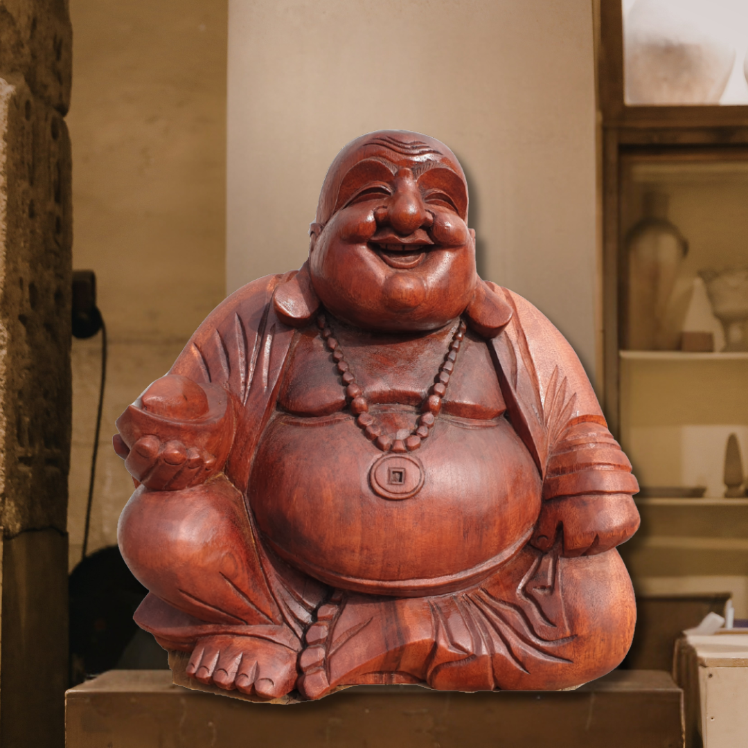 Wooden laughing Buddha statue in a room setting