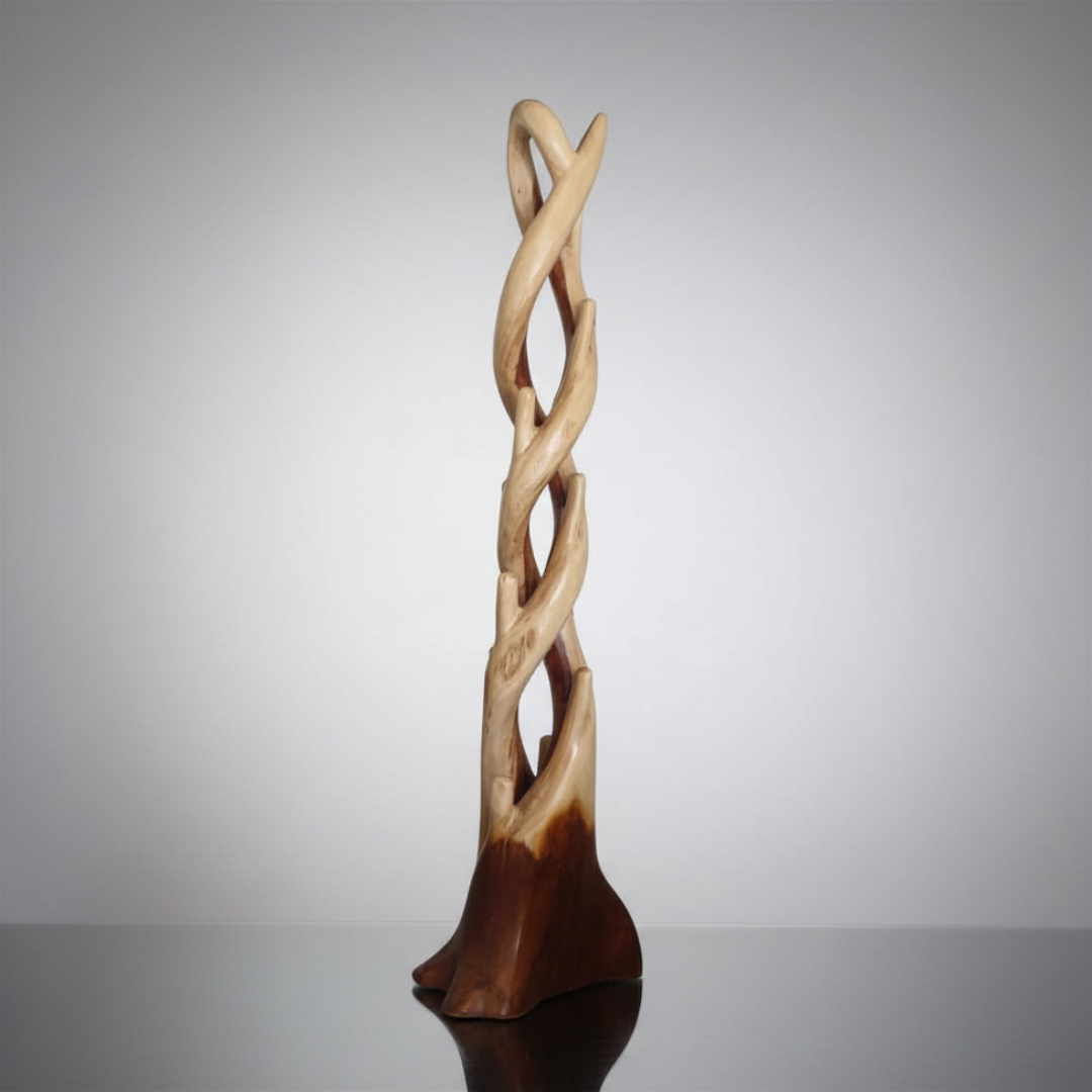 Wooden sculpture with twisted design on a reflective surface
