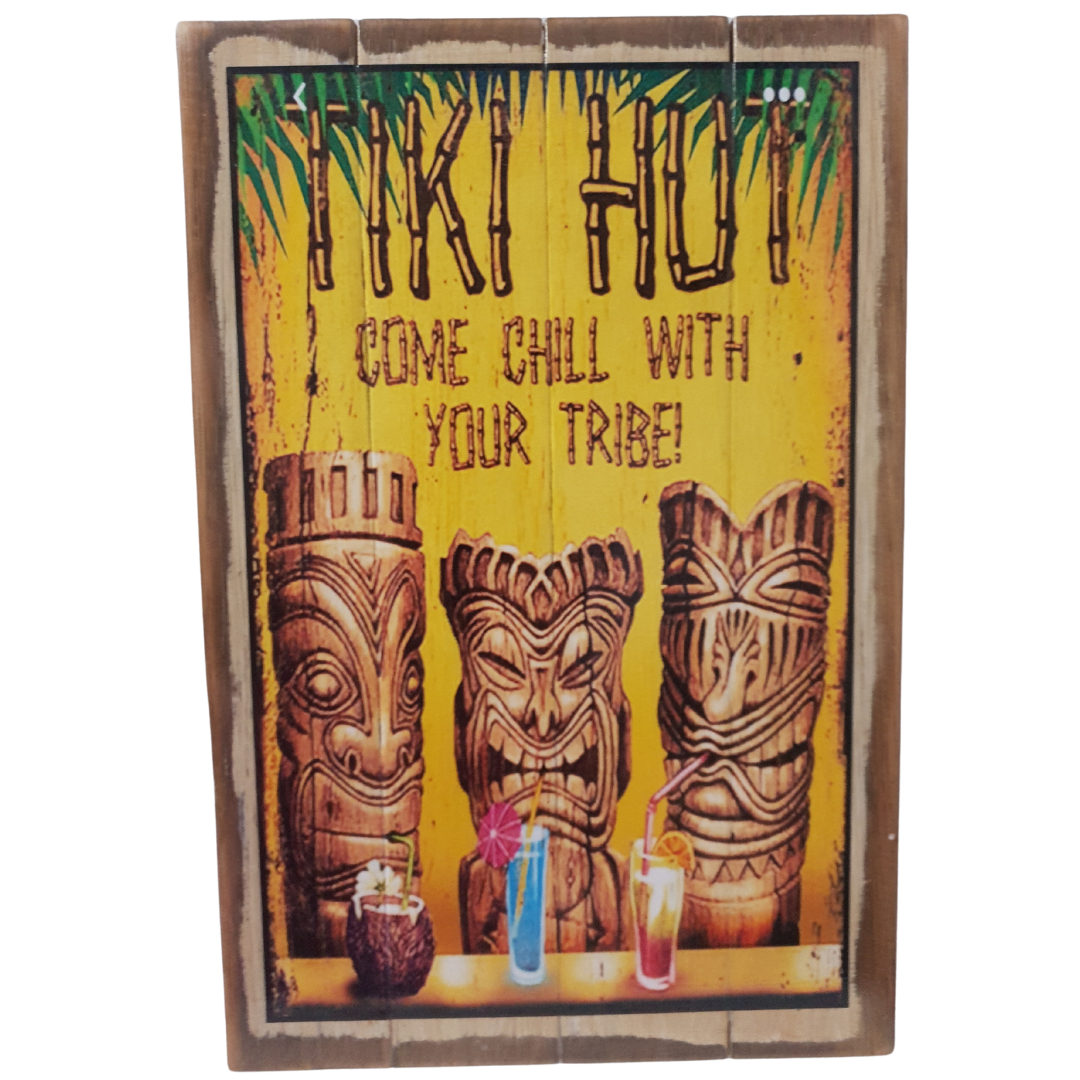 Yellow wooden wall plaque with three carved wooden statues and tropical cocktails, reading Come Chill With Your Tribe