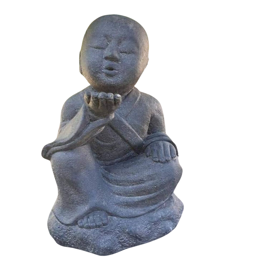set on a white wall grey tones statue setting 