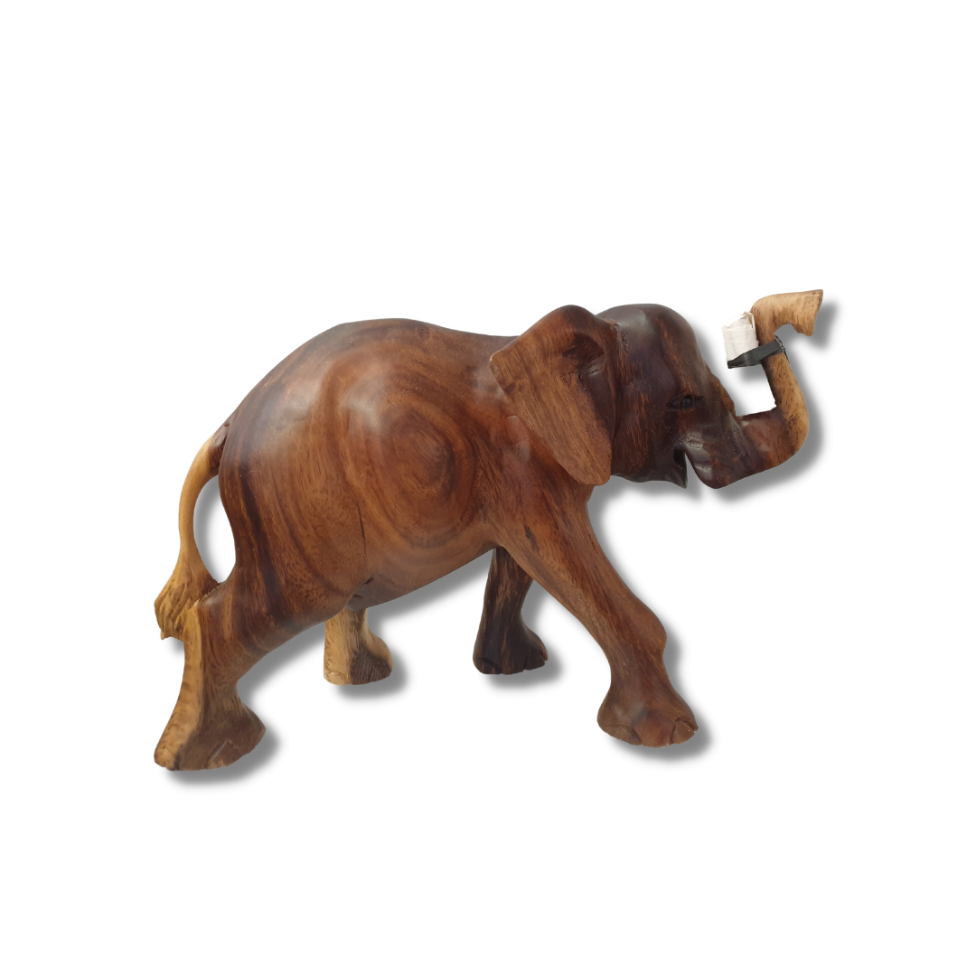 Solid wood elephant figurine with trunk raised, rich warm brown grain finish with natural wood markings, photographed on a white background. Tusks included separately for safe delivery style 3