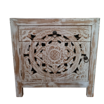 Front view of a reclaimed teak bedside table with intricate Mandala cabinet panel and ring pull drawer in chalky whitewash finish