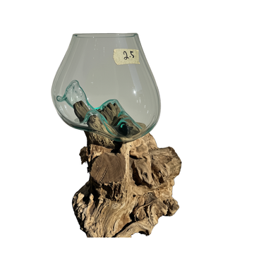 A clear glass vase with a rounded bulbous shape, displayed on a natural brown wood base. Inside the vase, a small turquoise glass fish decoration is partially visible.