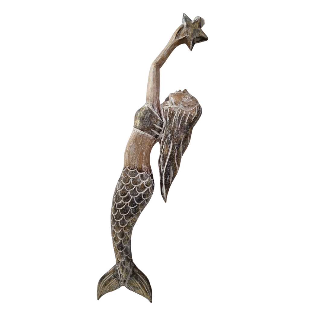Handcrafted wooden mermaid wall art holding a starfish, displayed on a white wall, rustic coastal décor