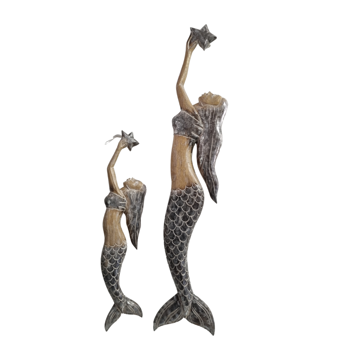 two Handcrafted wooden mermaid wall art holding a starfish, displayed on a white wall, rustic coastal décor 1x large piece 1x small 