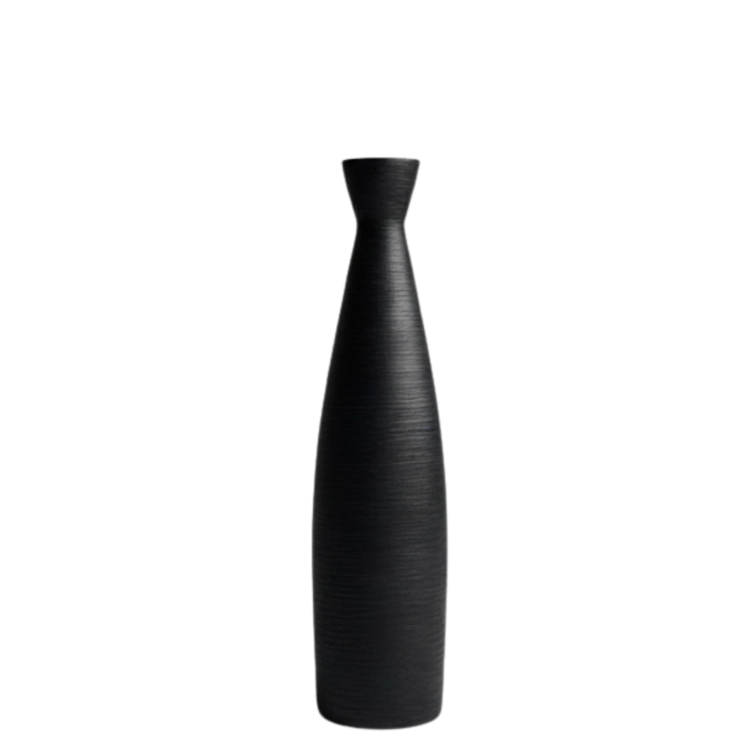 Mila Floor Vase styled in a dark moody entryway with black feather wall art and timber console
