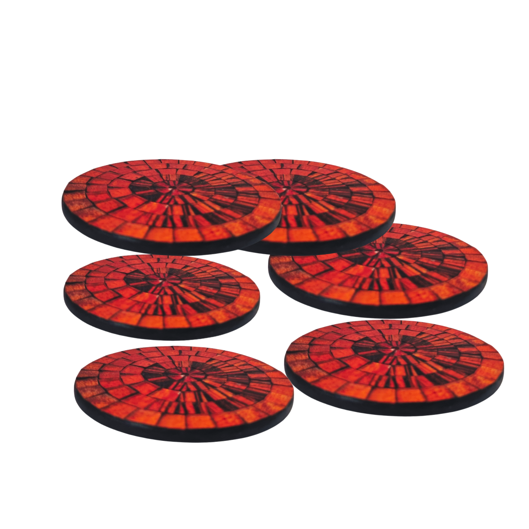 A set of round mosaic drink coasters in various orange colors