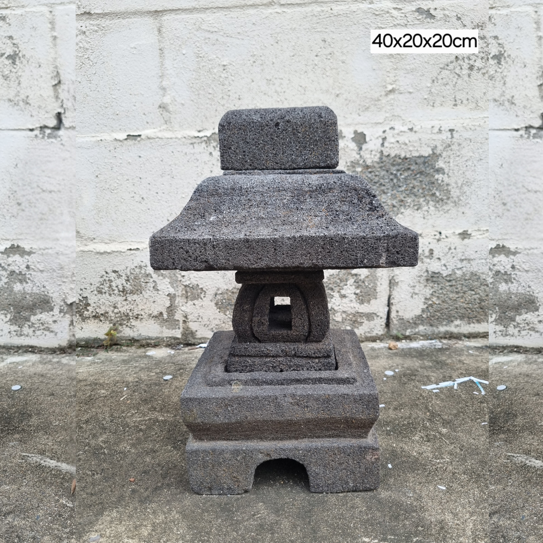 Natural Stone Garden Lantern 40x20x20cm – handcrafted lava stone pagoda lantern against stone wall, rustic outdoor garden decor