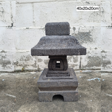Natural Stone Garden Lantern 40x20x20cm – handcrafted lava stone pagoda lantern against stone wall, rustic outdoor garden decor
