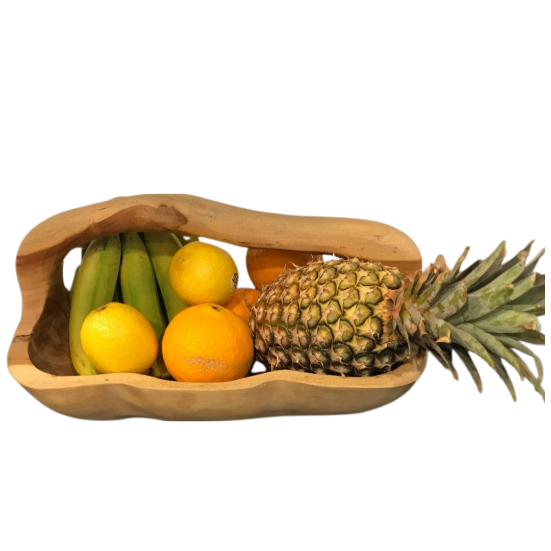 Wooden fruit basket with bananas, oranges, and a pineapple on a white background