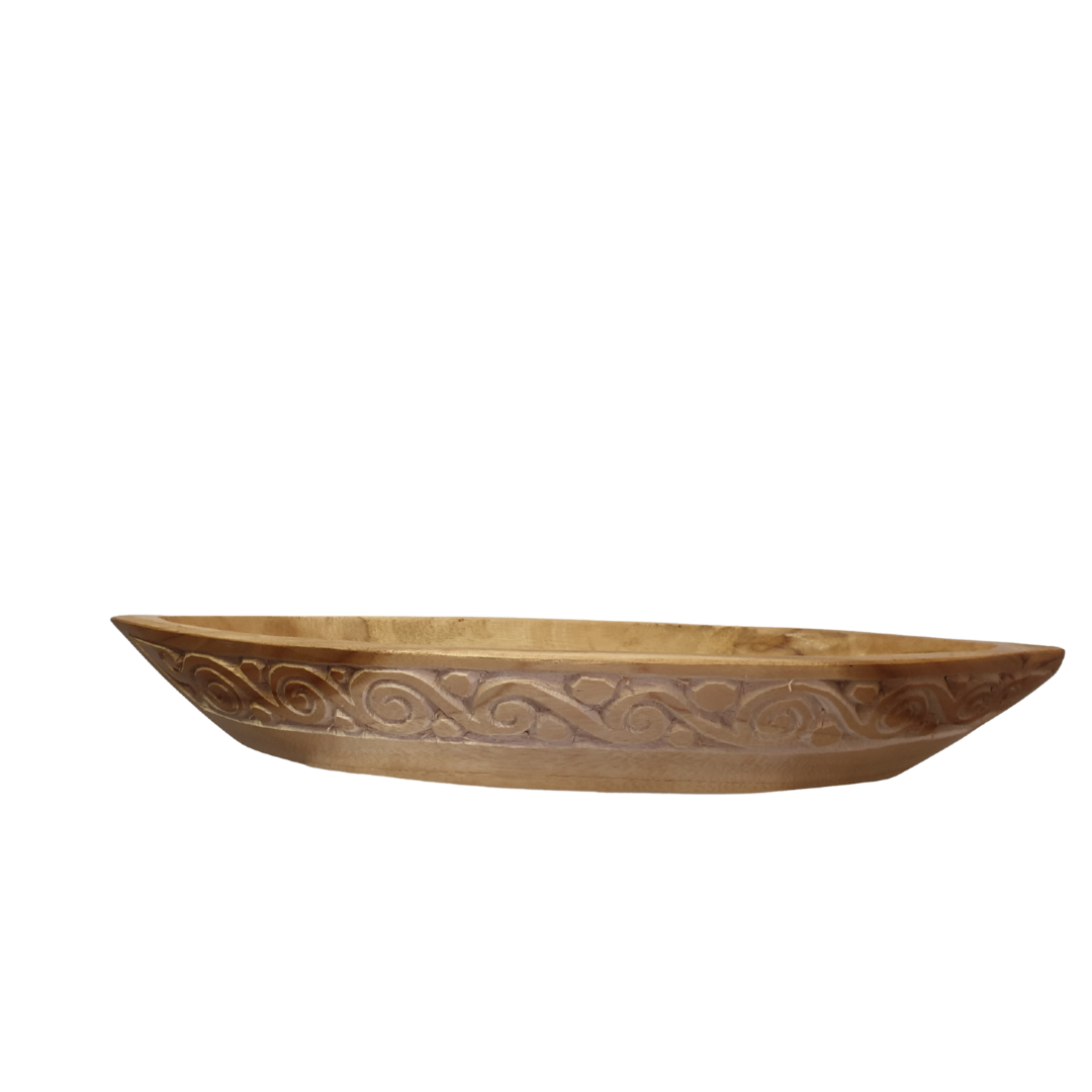boat wood tray with tribal carving on the side on a white back drop 