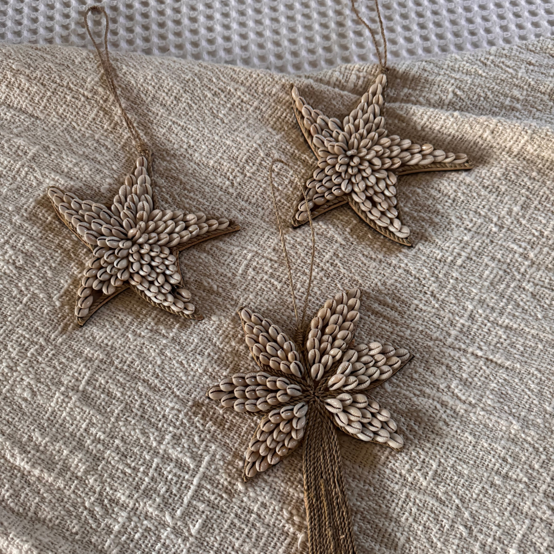 Coastal Shell Garland – All four styles Palm Fish Turtle Star flat lay on white