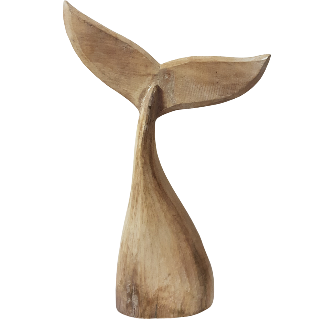 A handcrafted wooden carving of a whale tail with natural wood color and subtle blue hints.
