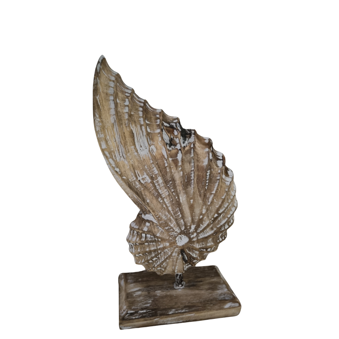 A handcrafted wooden conch shell decoration on a stand, with a natural beige and white color finish.