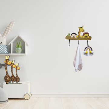 Children's room with shelves, toys, and decorative items on a white wall.