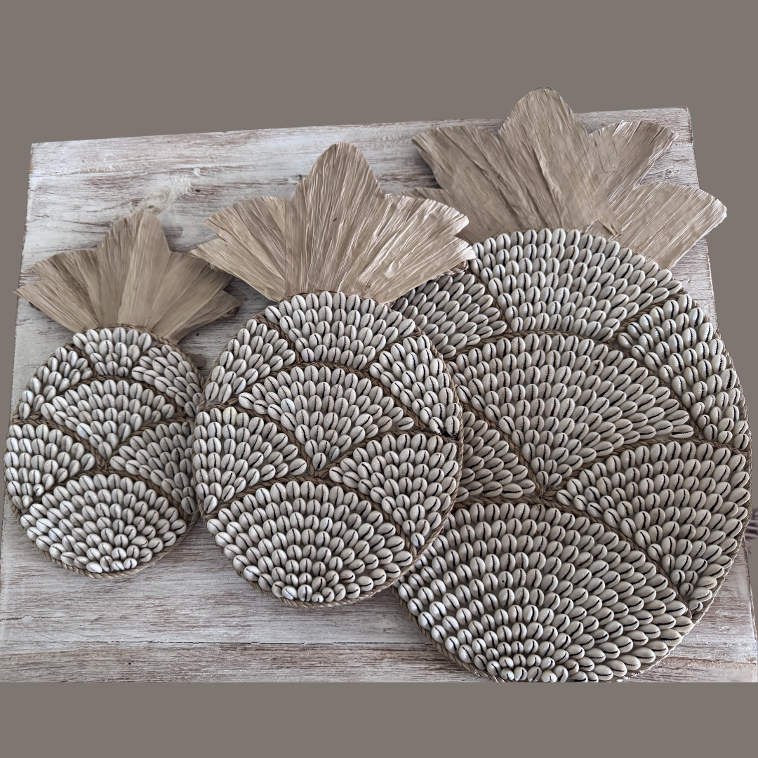 Set of three decorative wall art pineapple patern with textured patterns on a wooden surface