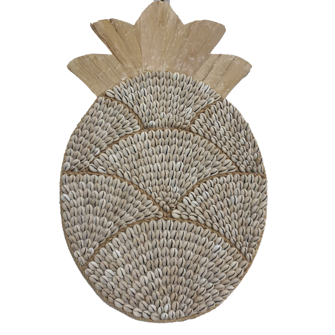 Pineapple-shaped decorative item with textured surface on a white background
