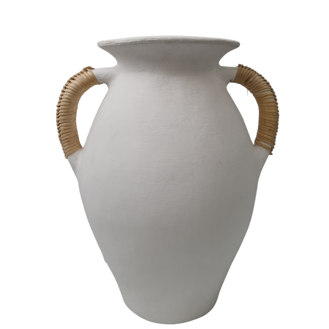 white pot with ratton handles, on a white background
