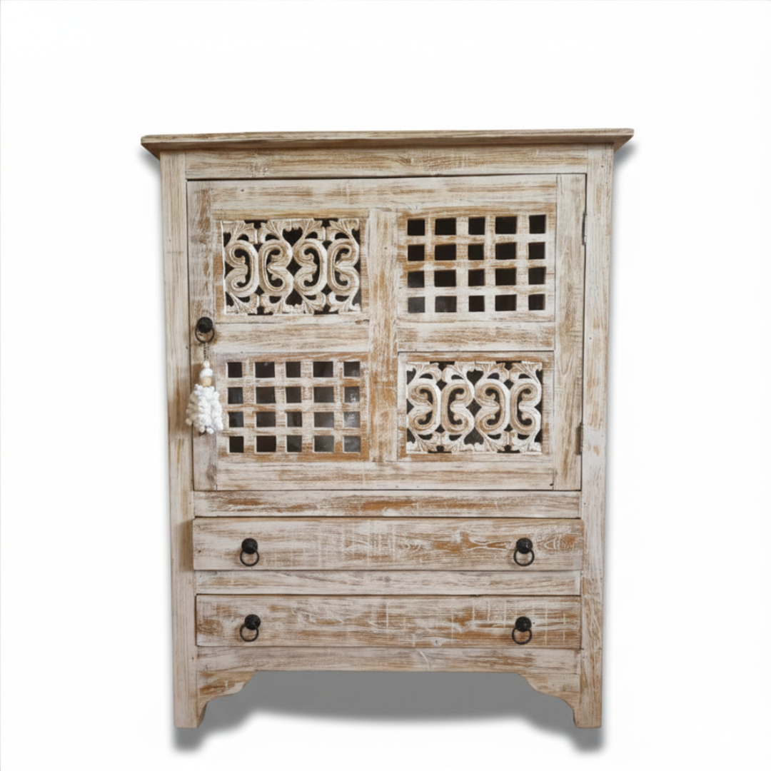 A rustic reclaimed teak wood cabinet with intricate carvings, featuring a white-wash finish and traditional hardware.
