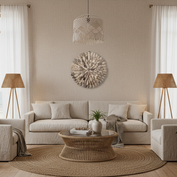 Round driftwood sunburst wall sculpture styled in a coastal boho living room with rattan furniture and linen sofa — 50x50cm wall art by Azure Decor