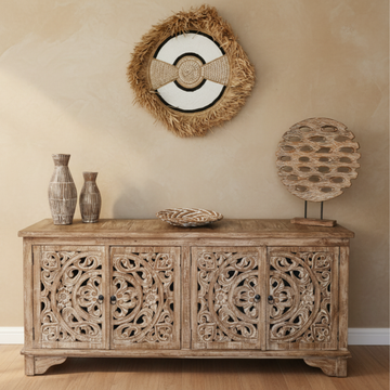 Whitewashed teak buffet styled with ribbed vases, woven seagrass bowl and rattan orb sculpture by Azure Decor