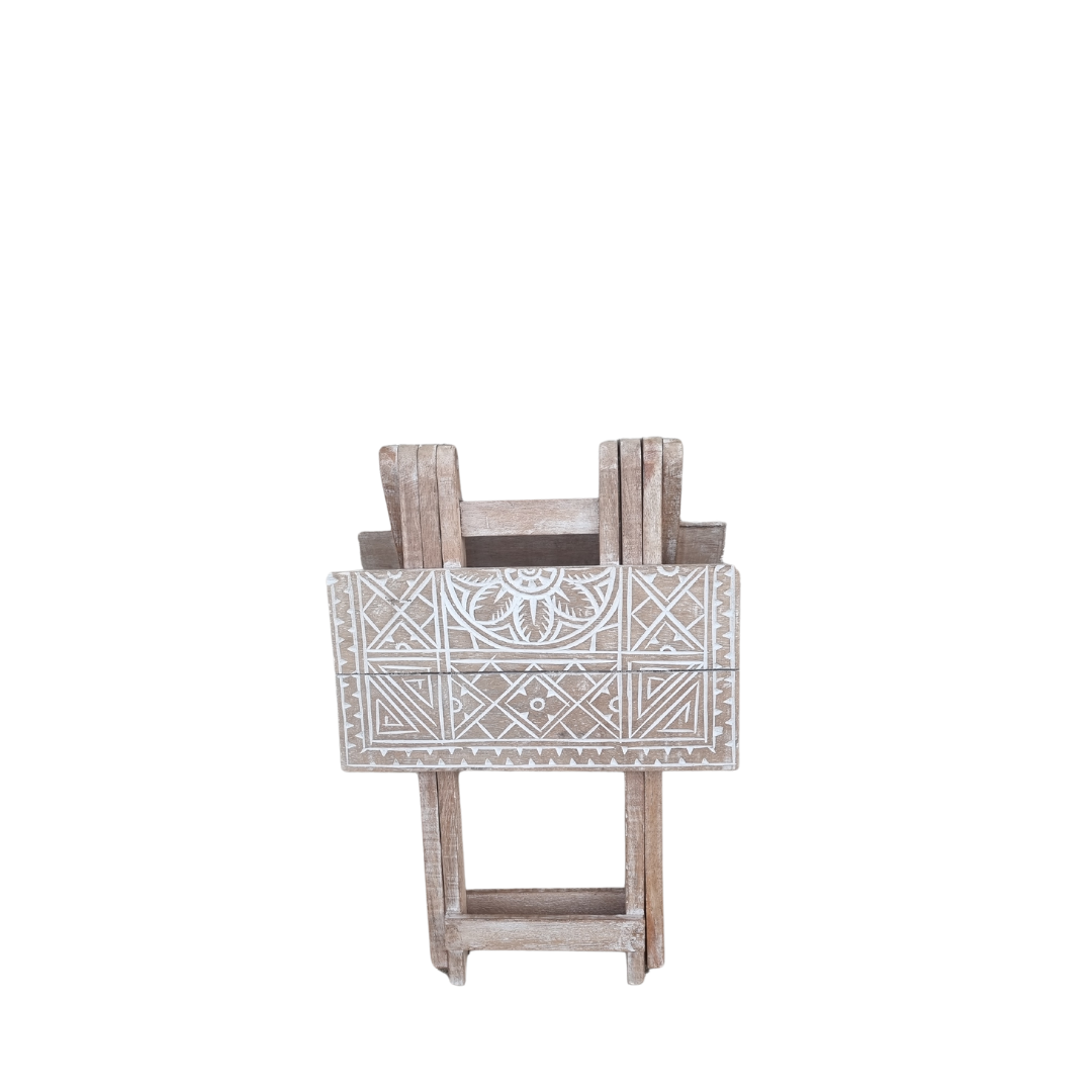 TablesRustic boho foldable wooden side table shown folded flat for compact storage, displaying hand carved geometric tribal pattern and natural matte wash finish on white background — Boho Natural Wash design 40cm x 40cm x 50cm by Azure Decor