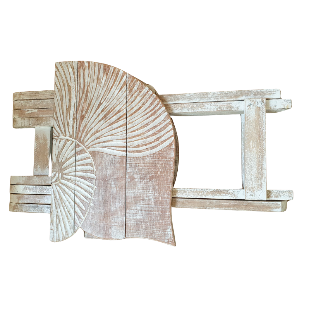 Rustic boho foldable wooden side table with hand carved nautilus shell design and natural white wash finish, shown folded flat for compact storage on white background — Nautilus design 48cm x 38cm x 50cm by Azure Decor