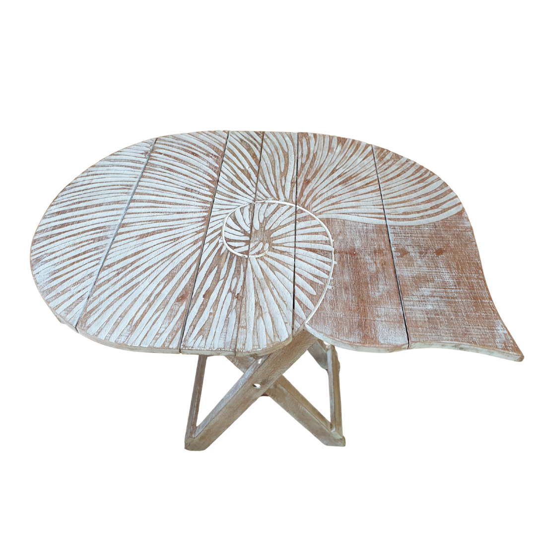 Rustic boho foldable wooden table with hand carved nautilus shell design and white matte wash finish, folding cross legs, on white background — Nautilus design 48cm x 38cm x 50cm by Azure Decor