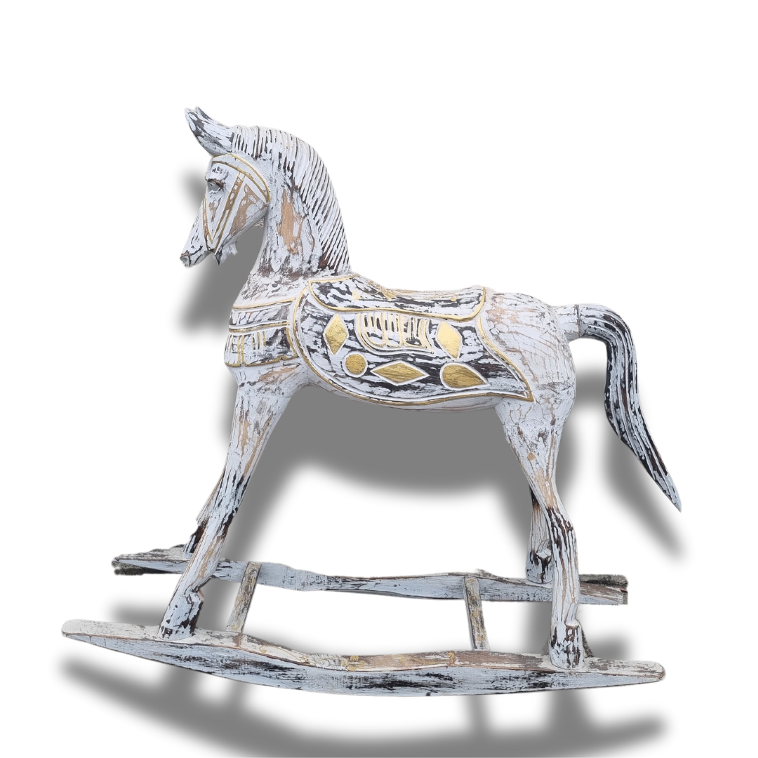 Rustic whitewash and gold hand-carved wooden decorative rocking horse on a white background showing full profile and intricate carvings