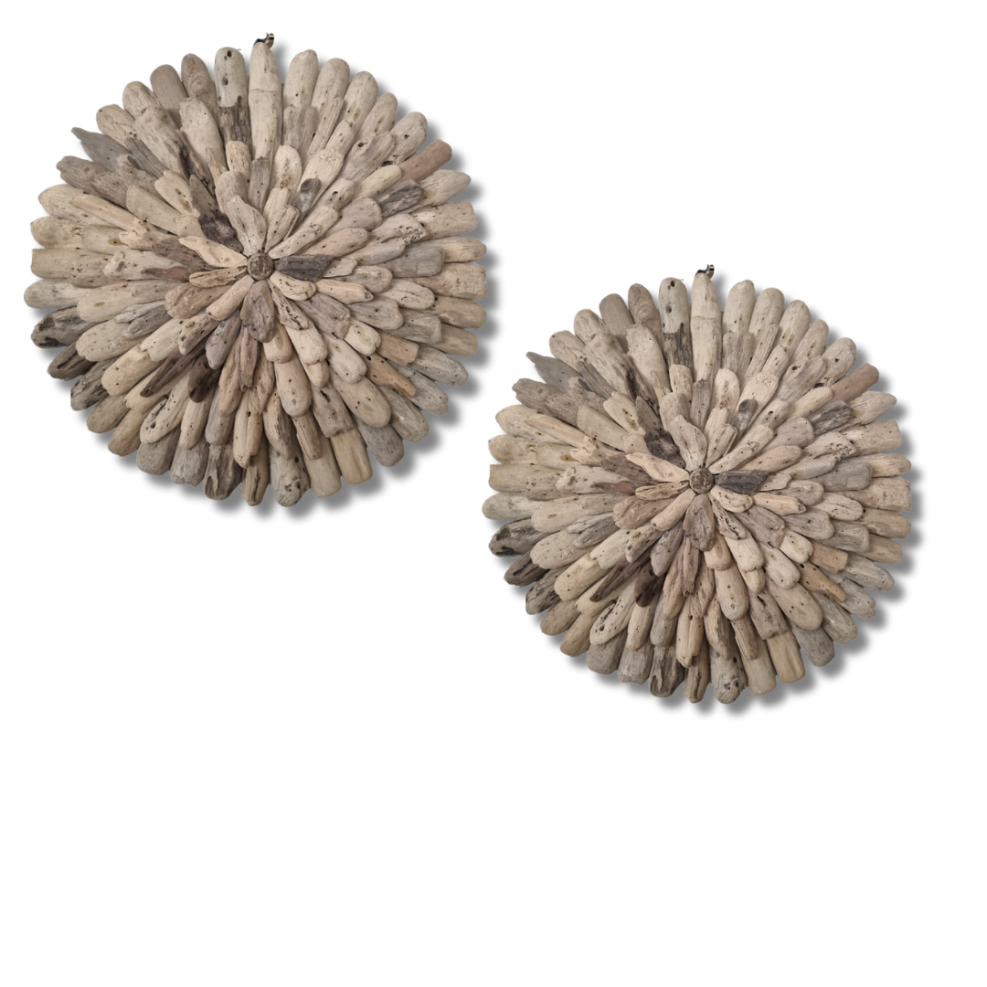 Two round decorative items made of natural materials on a white background