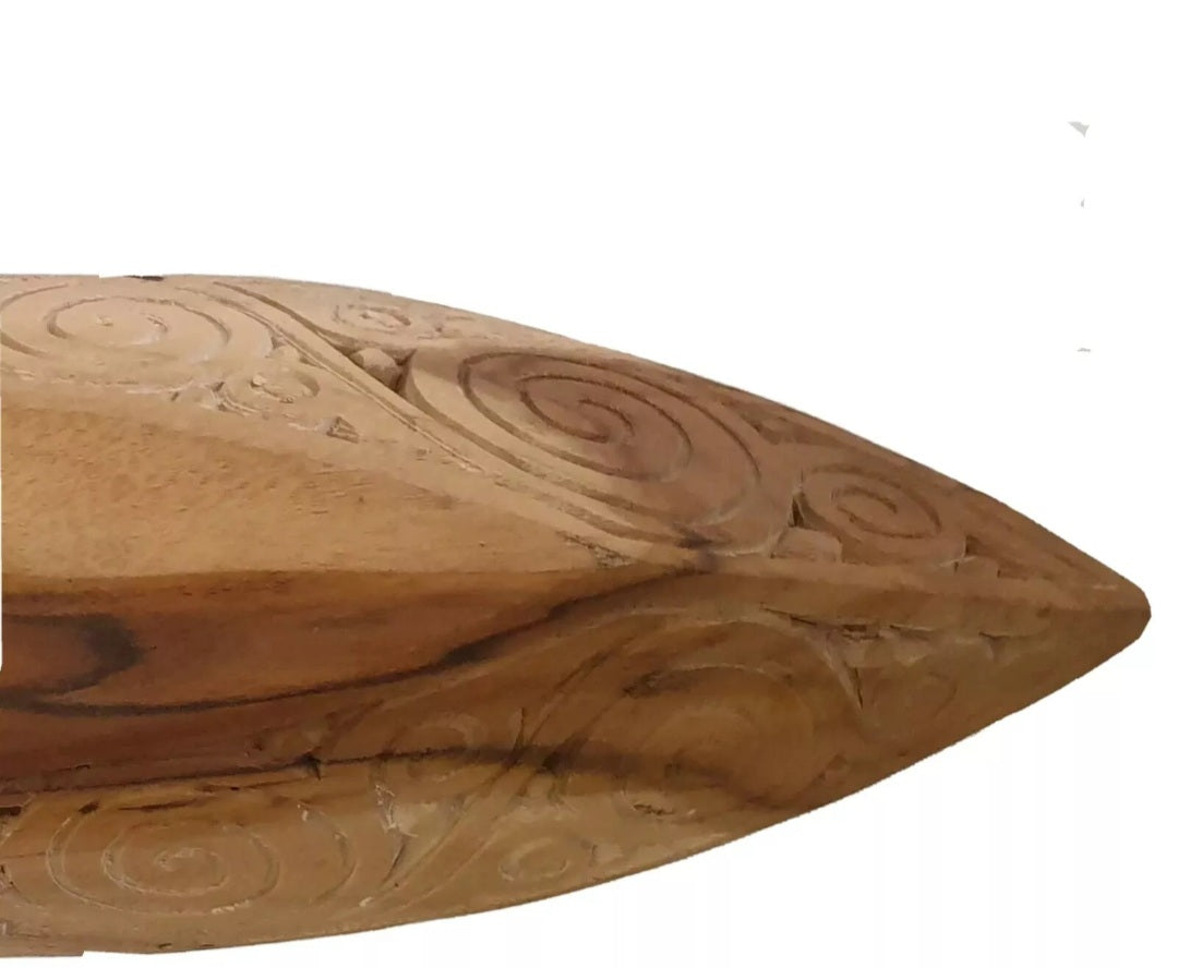 under shot of the carved piece