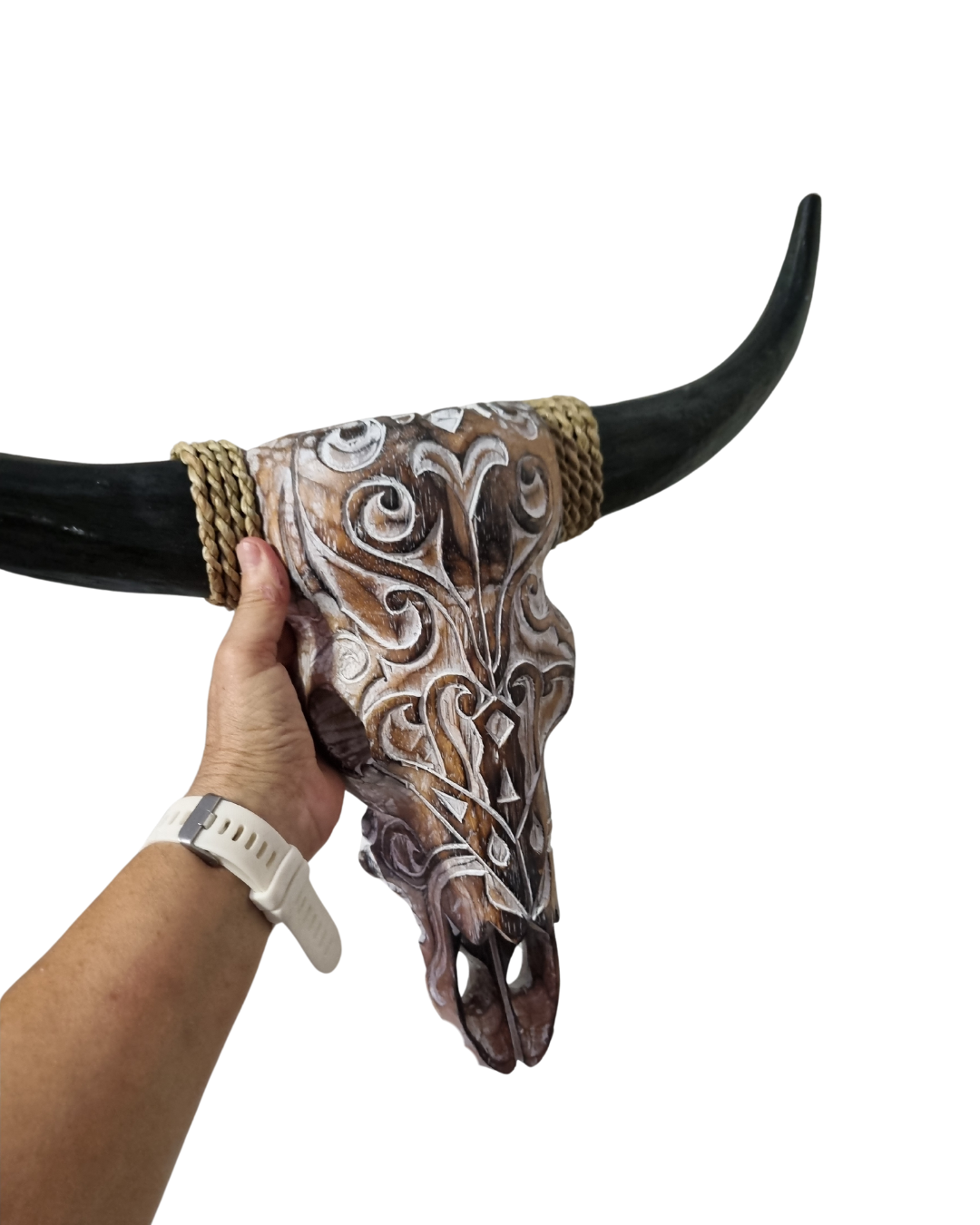 Wooden bull skull wall carving in brown wash finish with hand-carved tribal pattern and dark horns | Azure Decor"