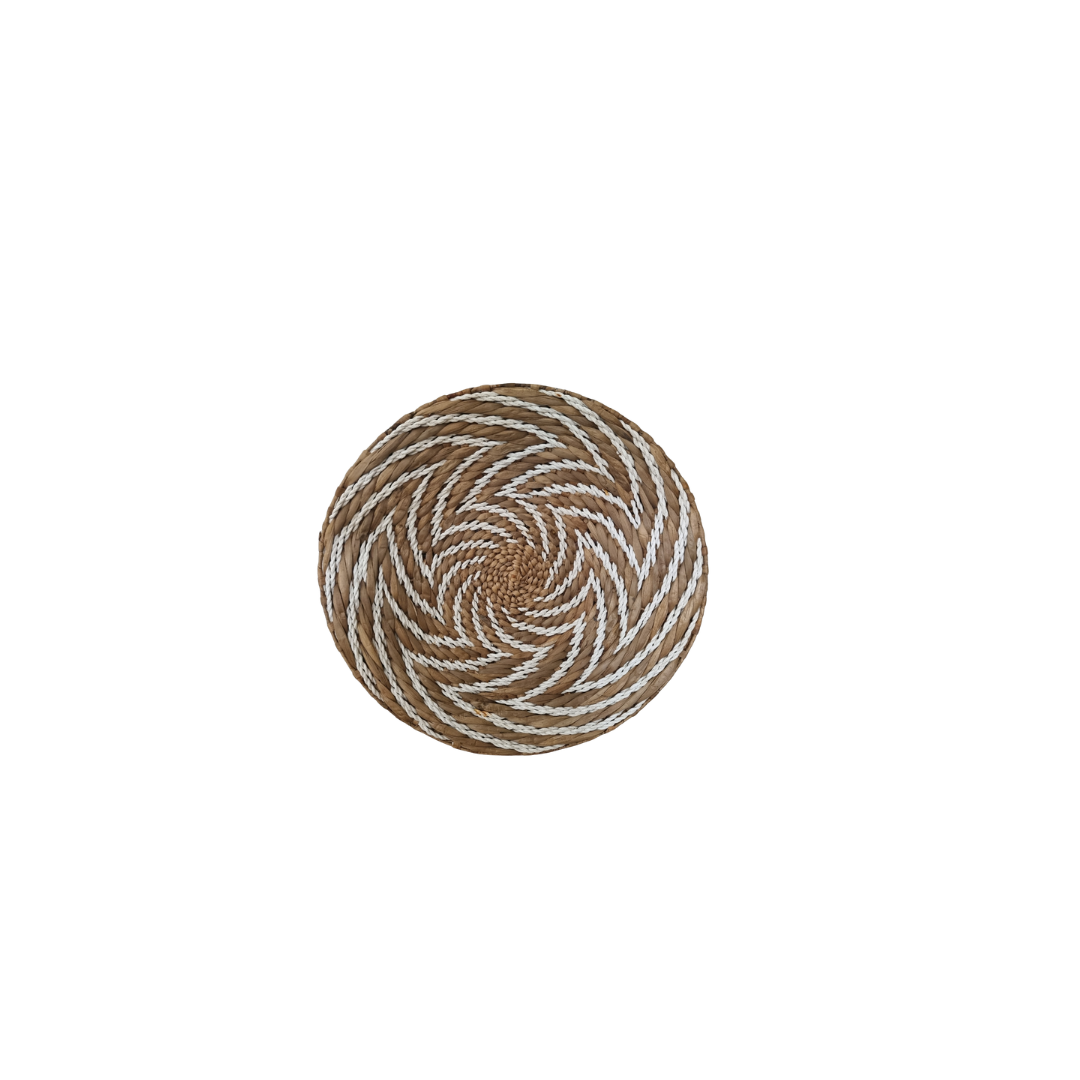 Round woven coaster with a wavy pattern on a white background