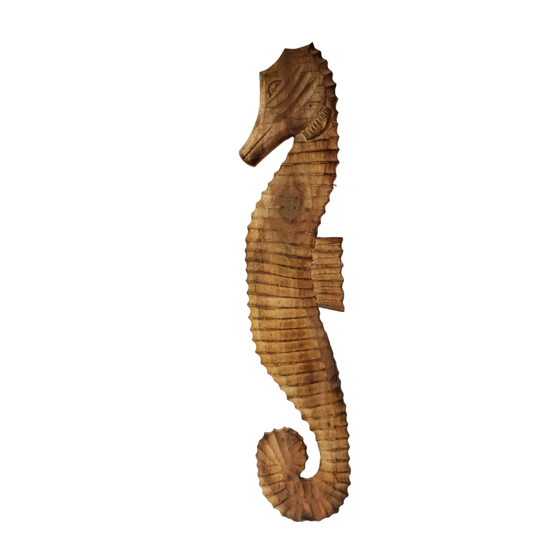 Wooden seahorse ornament on a white background