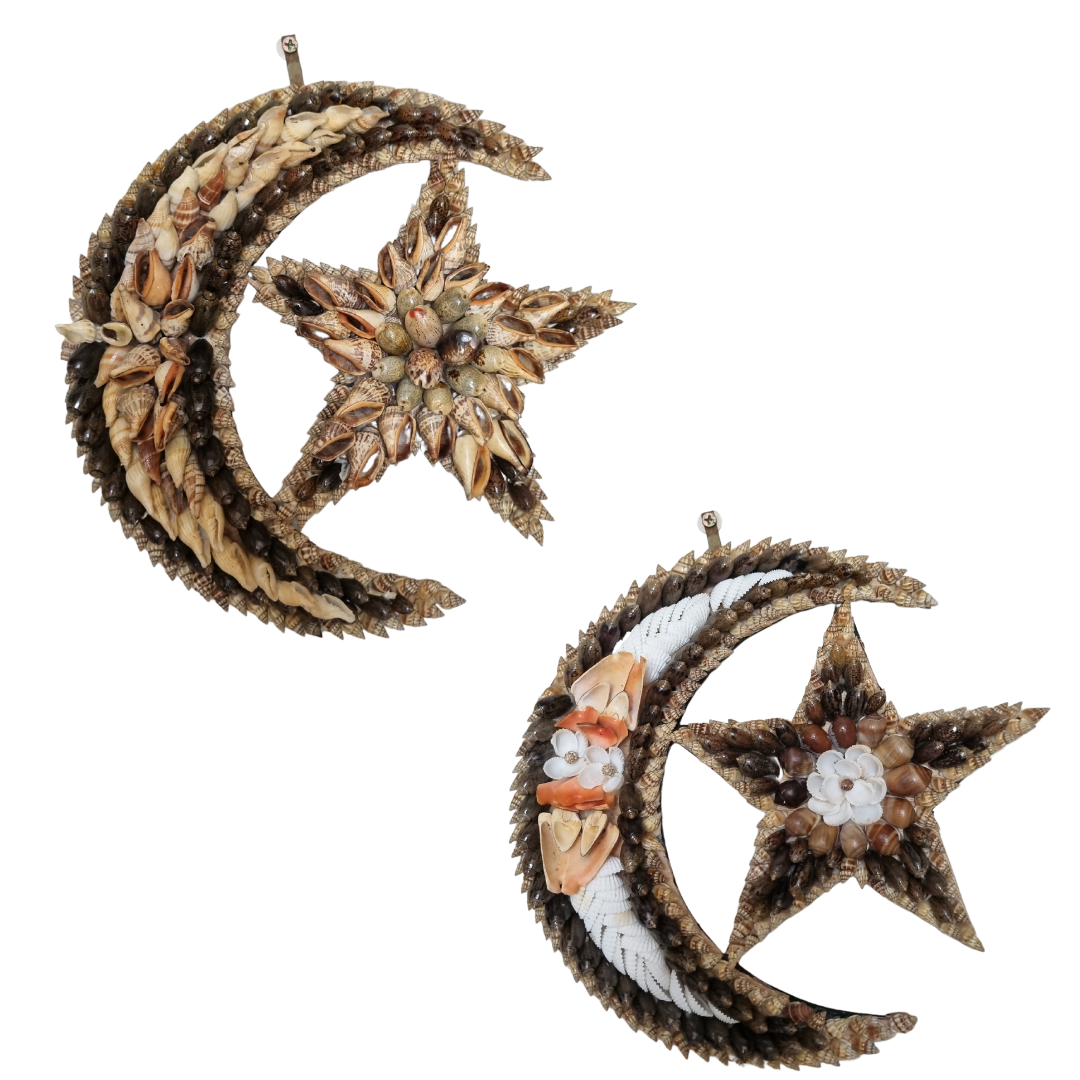 Decorative earrings shaped like moons and stars with intricate designs on a white background