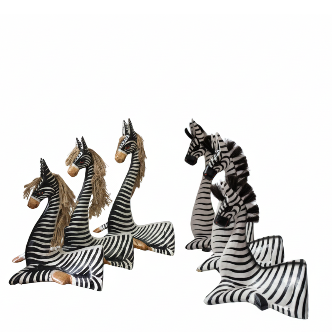 2 sets each set has one set with beige mane the other black mane both resting on a white back ground