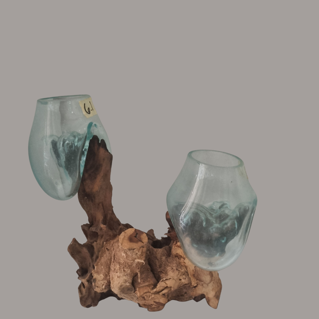 Decorative wall hook with glass cups and wooden base on a gray background