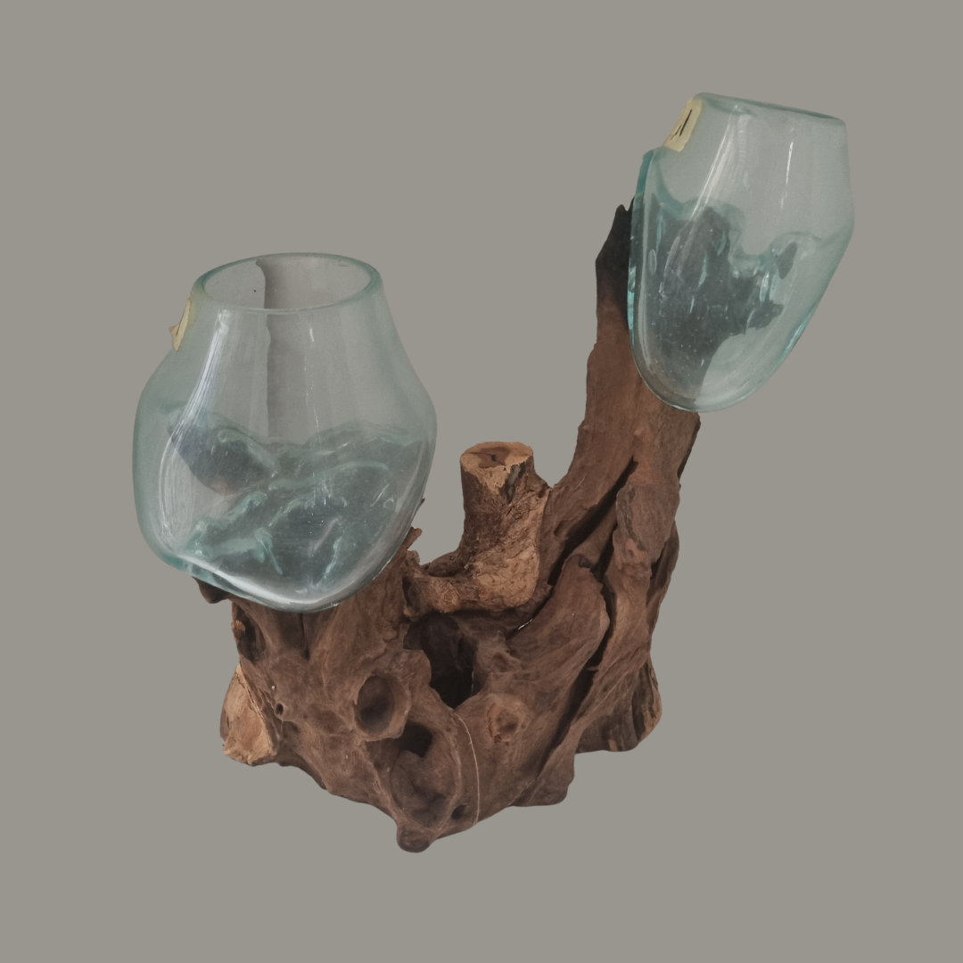 Two glass vases on a natural wood base against a gray background
