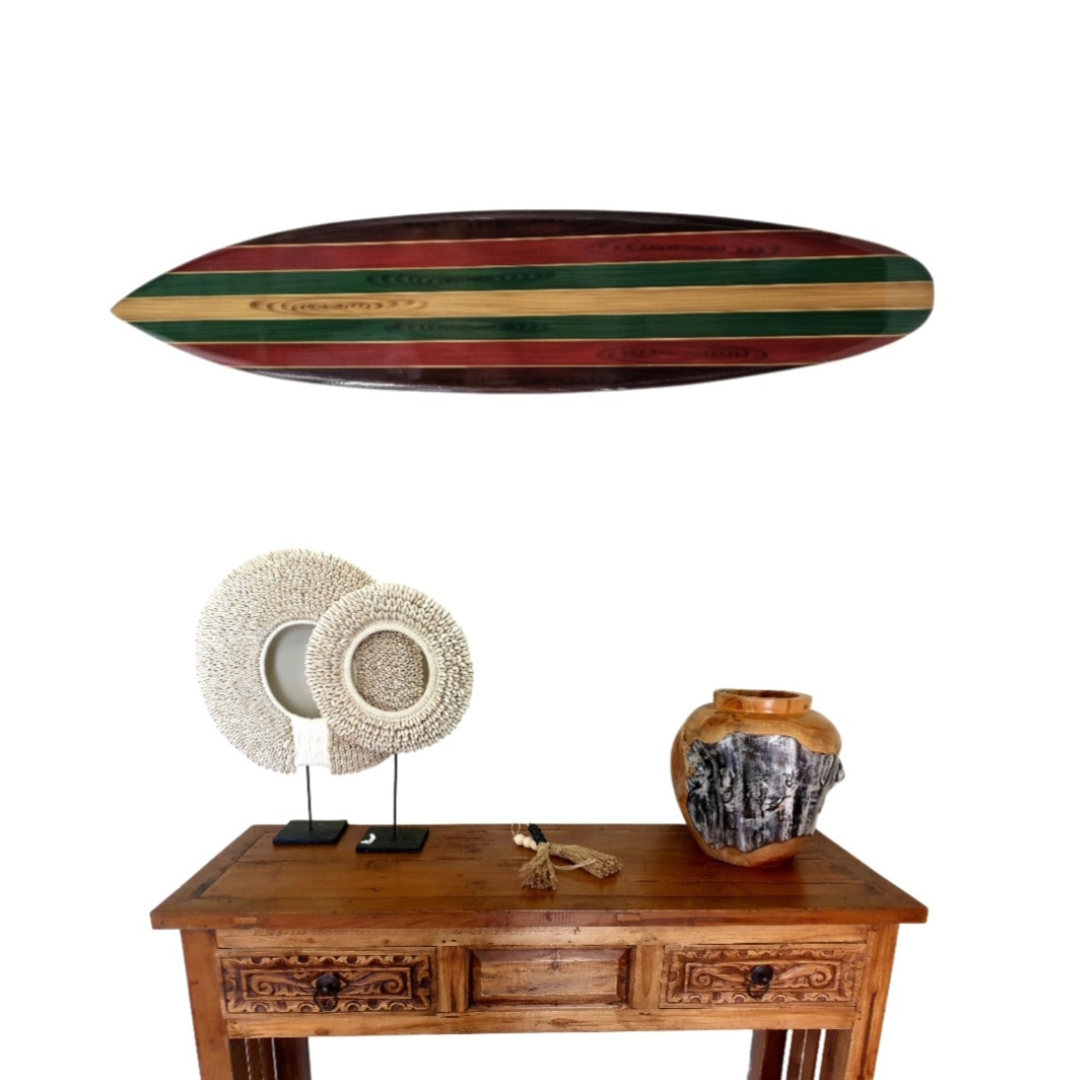 surfboard wall art above wooden carved table will shell art wooden vase and decorative pieces