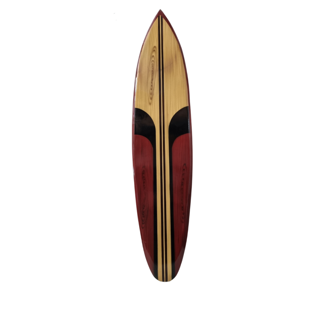 Wooden surfboard with red and black design on a white background