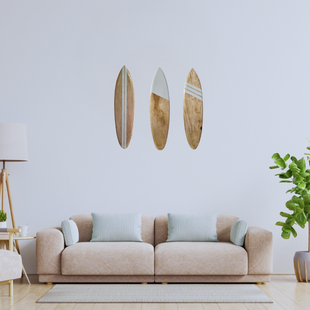 Beige sofa with decorative pillows in a living room setting with wall mirrors.