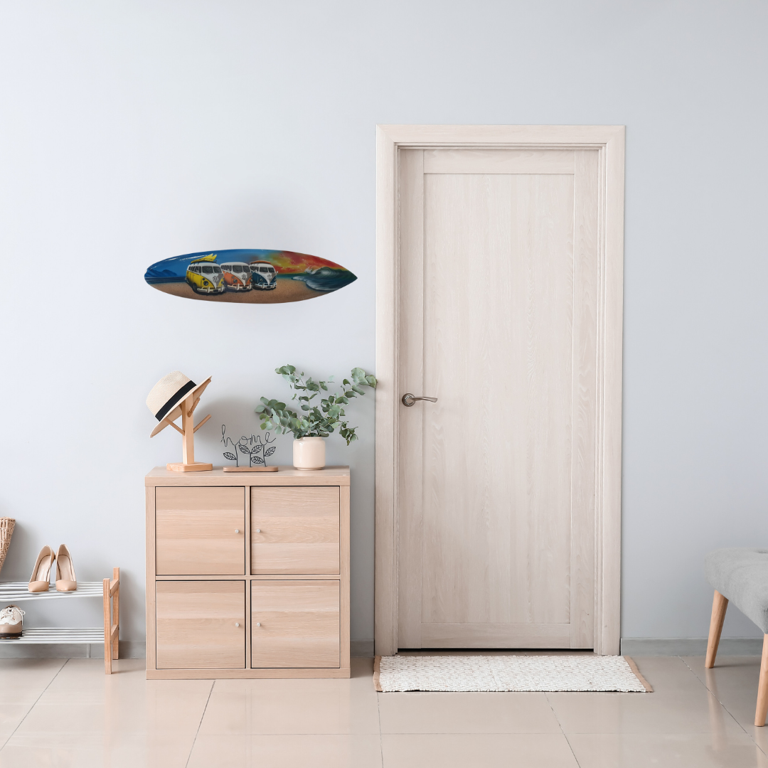 Modern interior with wooden cabinet, surfboard art, and decorative items.