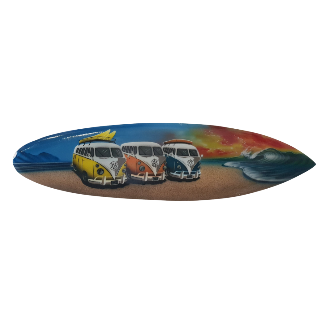 Decorative surfboard with three colorful vans on a beach scene