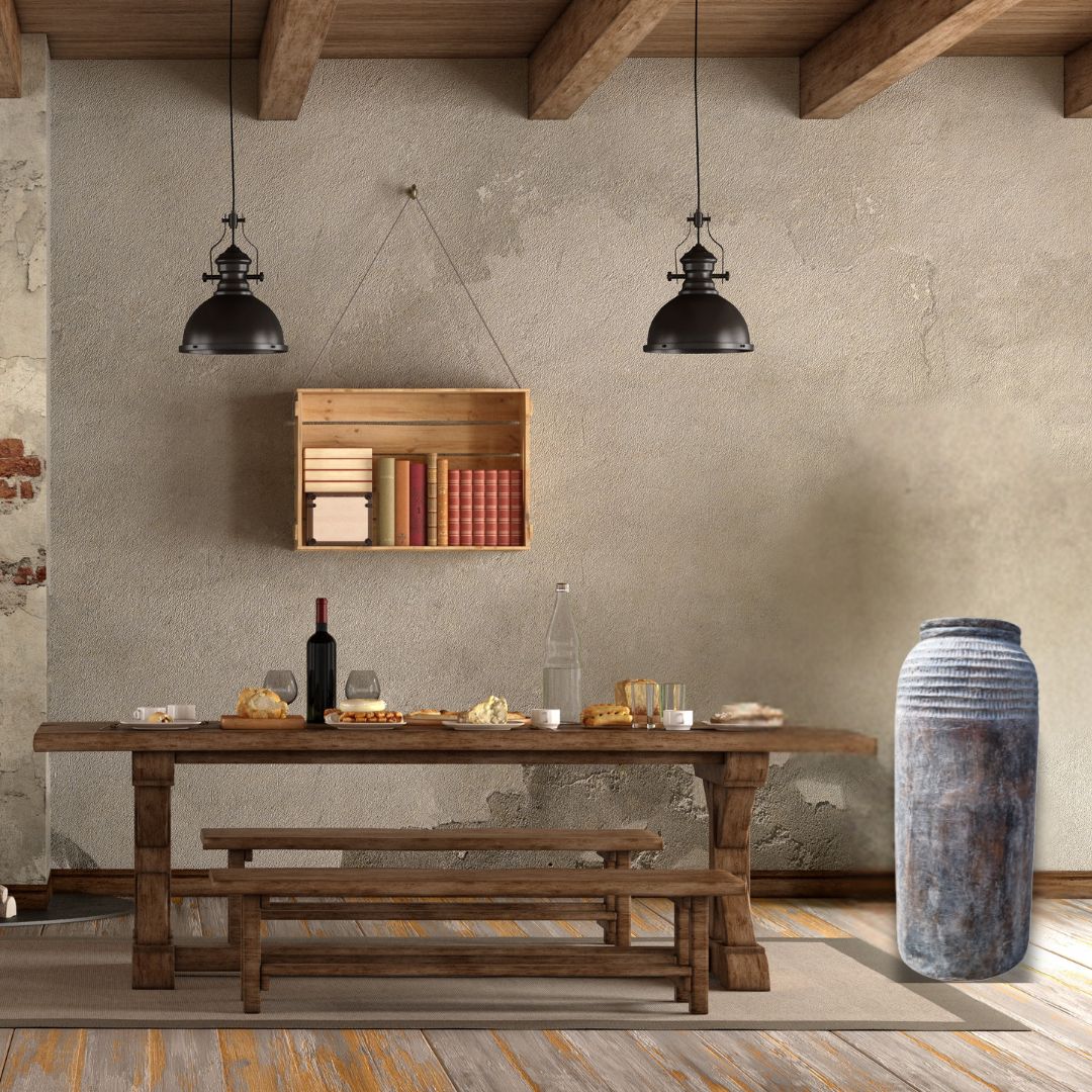 Tall rustic GRC floor vase shown in two settings – indoor timber bench and outdoor garden with terracotta pots | Azure Decor