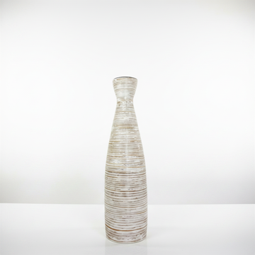 Decorative vase with ribbed texture on a white background