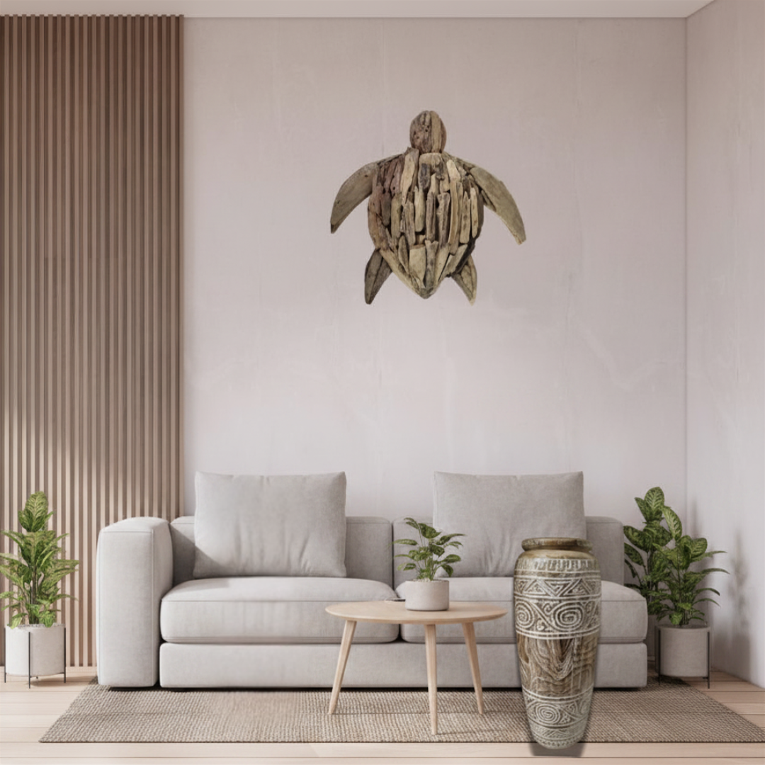 Tribal Harmony teak wood vases styled together in a modern coastal hallway  tapered cylinder vase (right) beside a timber slat wall panel, driftwood sea turtle wall art above, bleached timber floor